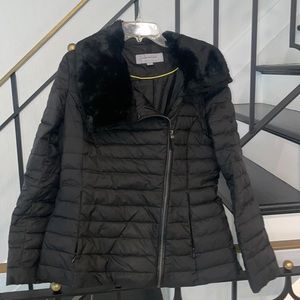 Andrew Marc black puffer coat with asymmetrical zip and fur collar